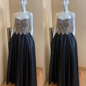 Hand beaded strapless black gown